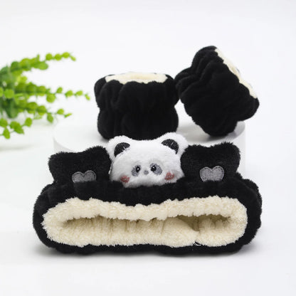 plush cat ears headband set featuring a cute panda design with soft black and white plush material.